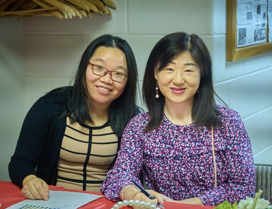 Two women smiling at Wilmington Community Evangelical Church